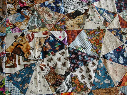 Some of the cat fabrics before quilting