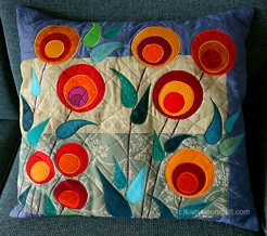 Pillow with stylized flowers